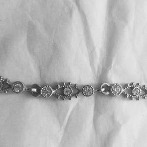 Evil eye Silver tone and rhinestone bracelet. Aprox 7"